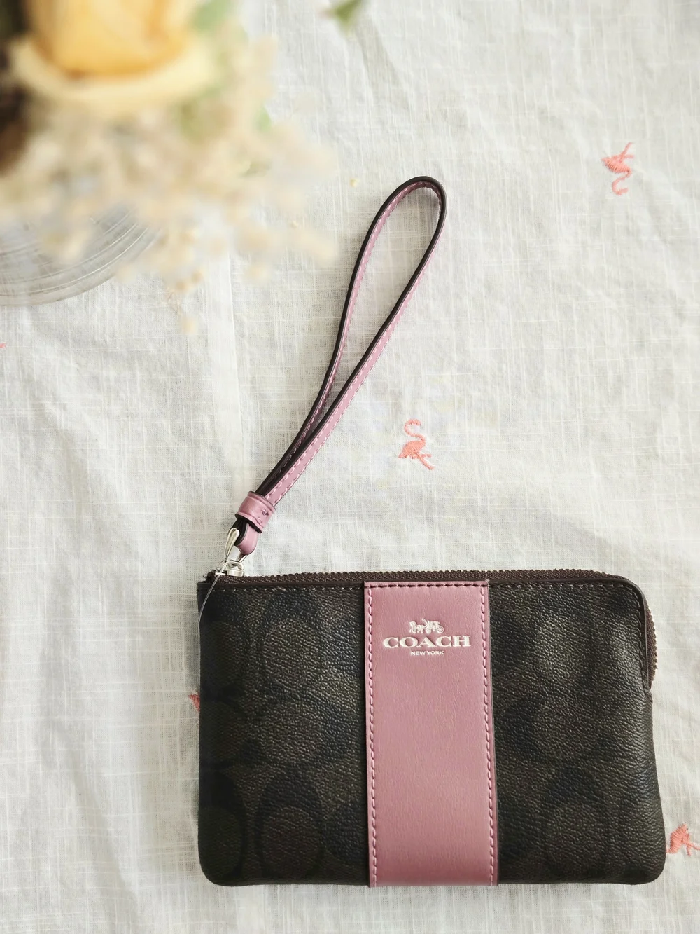 COACH Signature Wristlet Pouch in Brown and Dusty Pink
